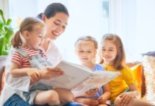 mom-and-children-reading-a-book-happy
